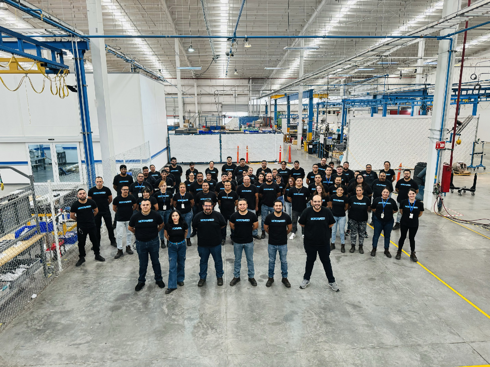 Team 2 photo on factory floor
